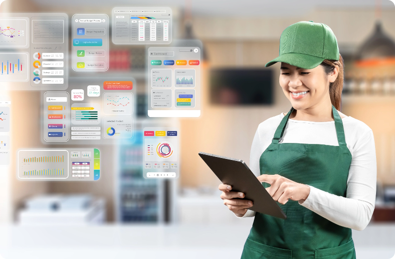 Small business worker using a tablet with digital dashboards displayed in the background